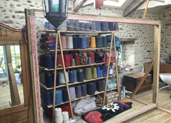 cones of wool on shelves